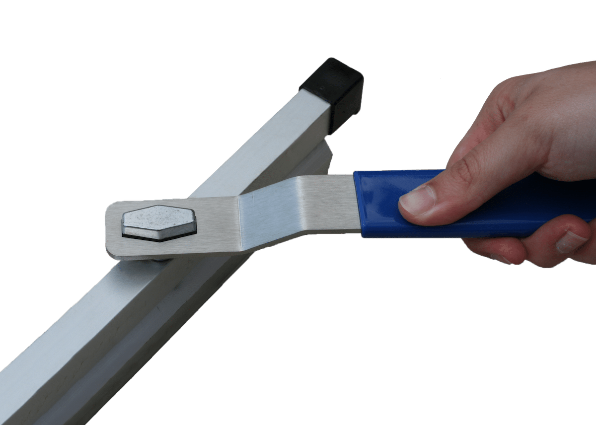Closeup of stick file wrench on clamp